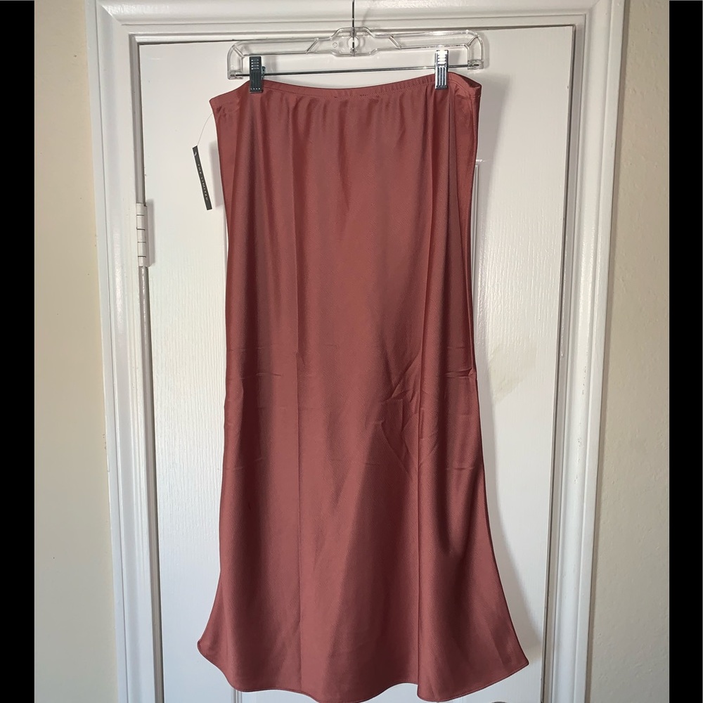 Mauve-ish color midi skirt.
